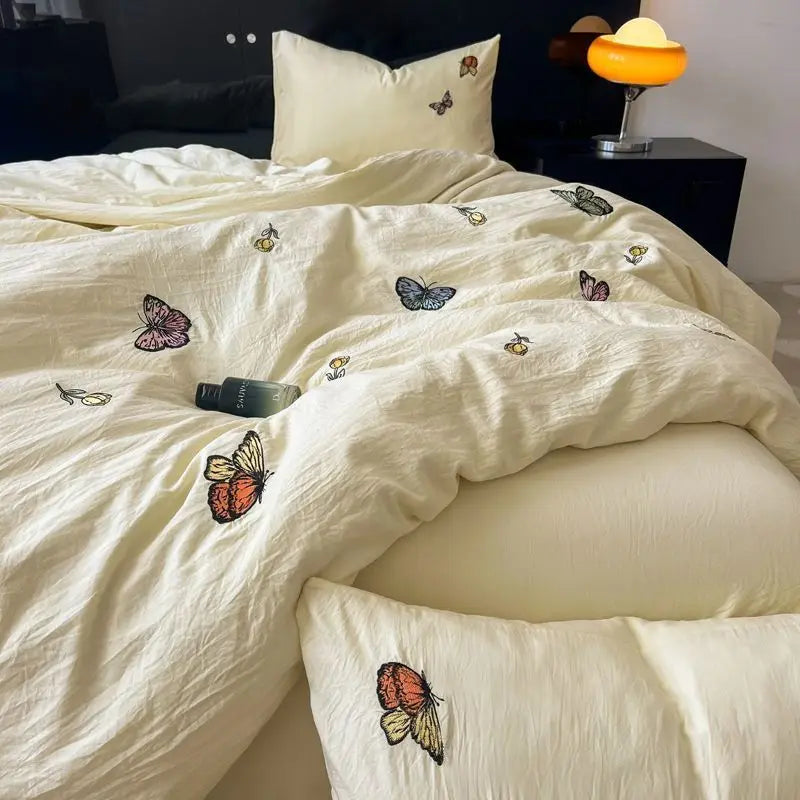 Advanced butterfly embroidered super soft water washing quilt bedding four -piece pure color bed sheet dormitory three -piece